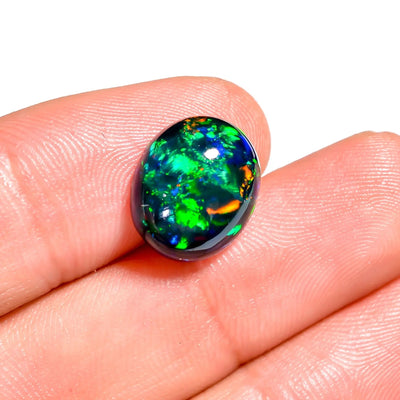 4.5 Ct Black Ethiopian Opal with Vibrant Multi Fire Color Play (13 x 11 x 6 MM)