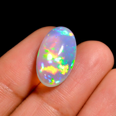 5.5 Ct White Ethiopian opal with Green-Blue Dominant with Multi-Color Flash Fire Play (18X10X6 MM) Natural Oval Cabochon