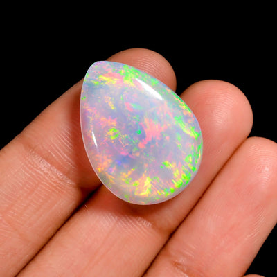 12Ct White Ethiopian Opal Cabochon with Multi-Color Fire from Ethiopia's Welo region (23×17×5 mm)