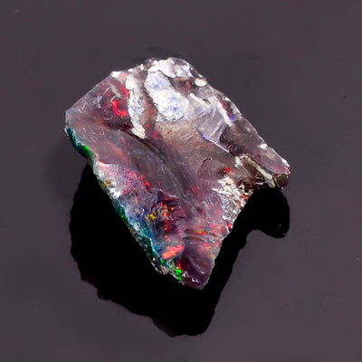 5 Cts to 12.5 Cts Natural Black Ethiopian fire raw opal with Vibrant Play of Color (7X14X12 mm to 22X16X4 mm)