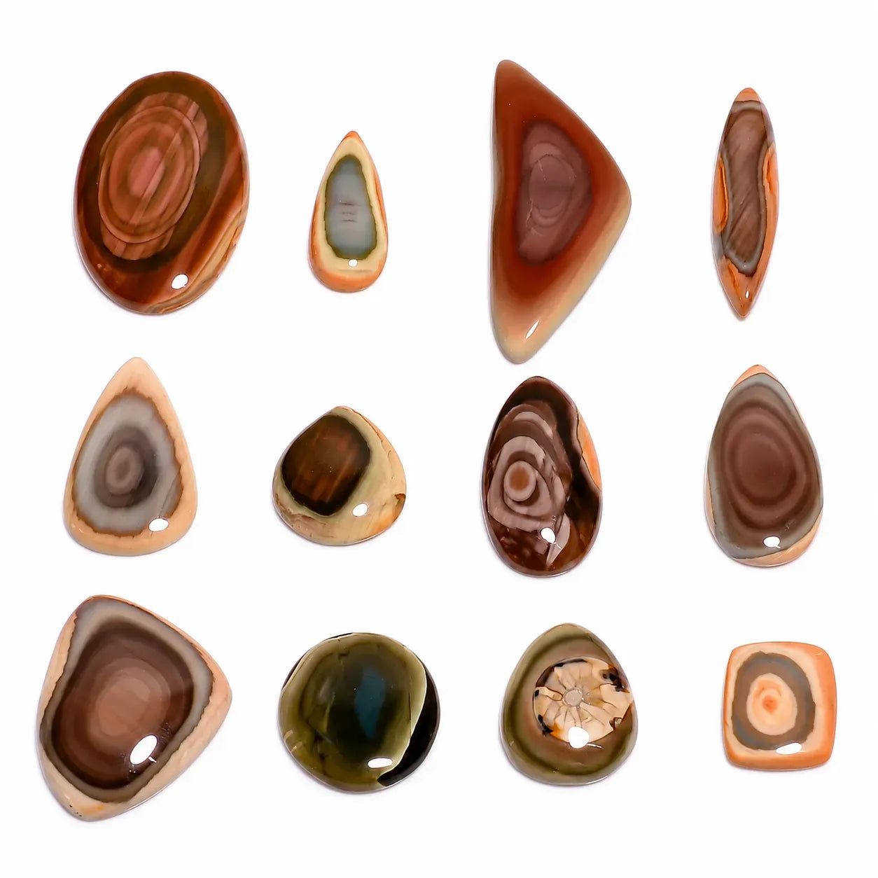 Collection of various brown and beige stone pendants on a white background
