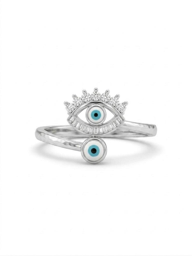 925 sterling silver evil eye bypass ring close up showing detailed open wrap design and sparkling cubic zirconia stones