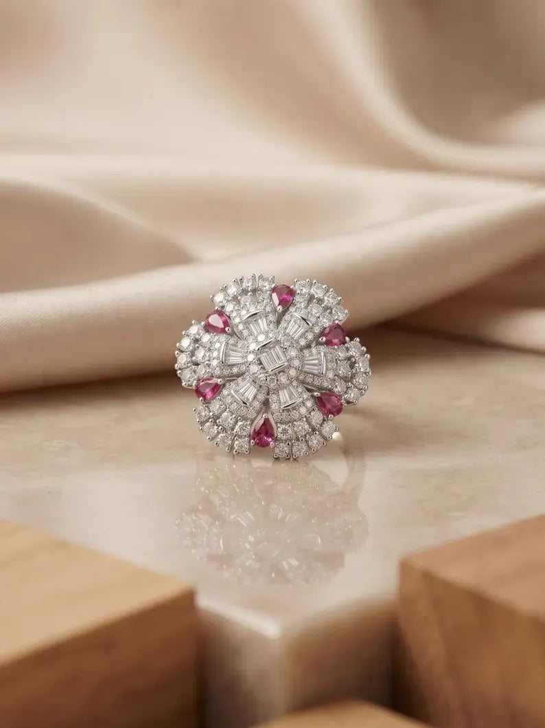 925 sterling silver rings featuring a floral cluster design with pink CZ and sparkling accents.