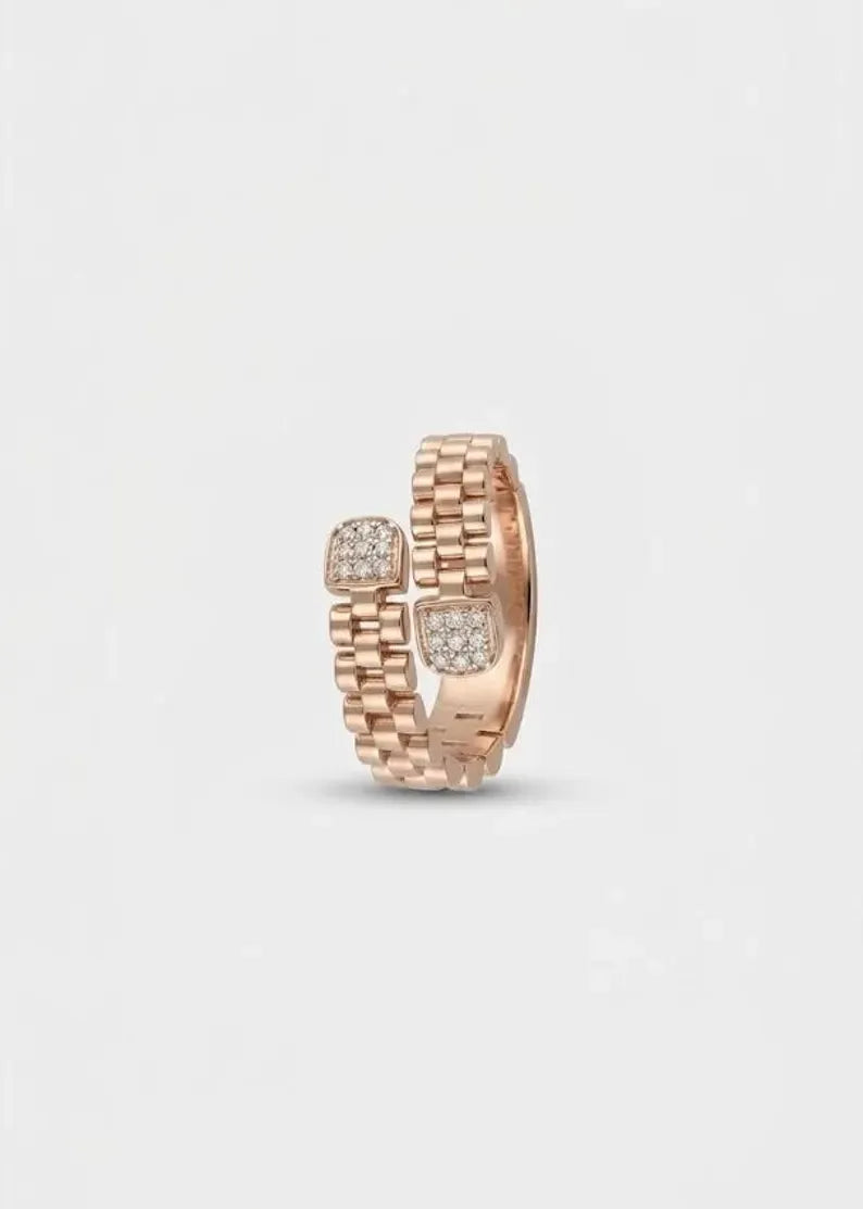 Side view of a rose gold plated link-style open ring with overlapping ends and square CZ detailing