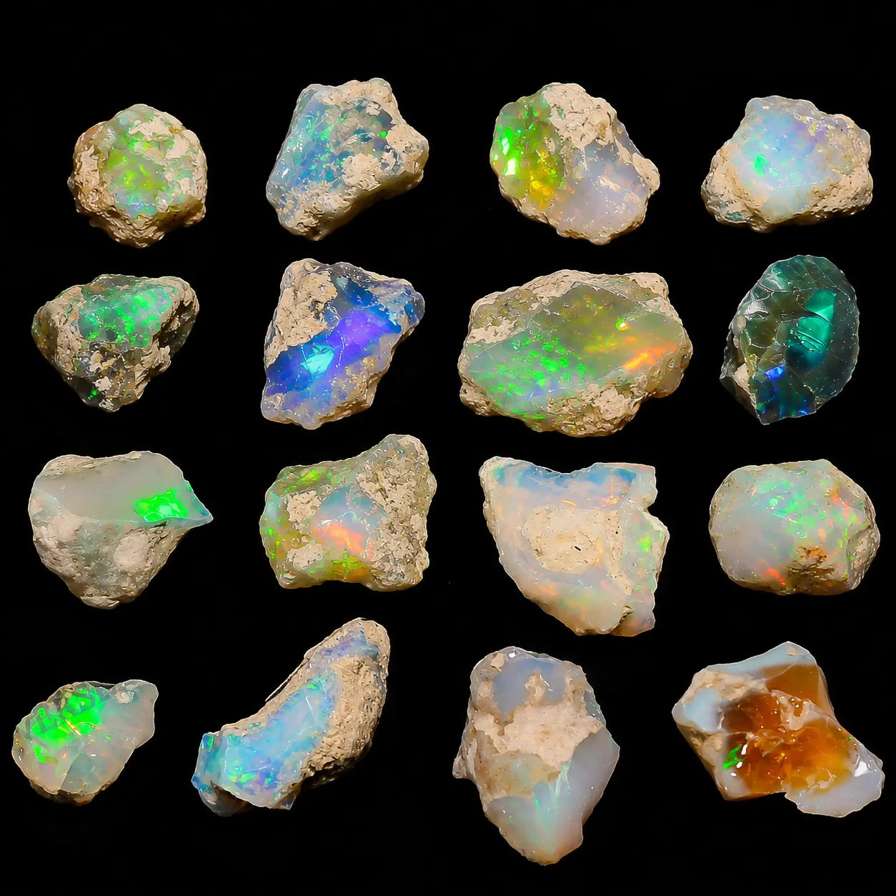 Collection of raw opal stones with colorful fluorescence on a black background