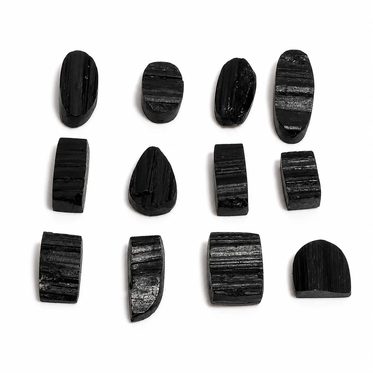 Set of black stone beads on a white background
