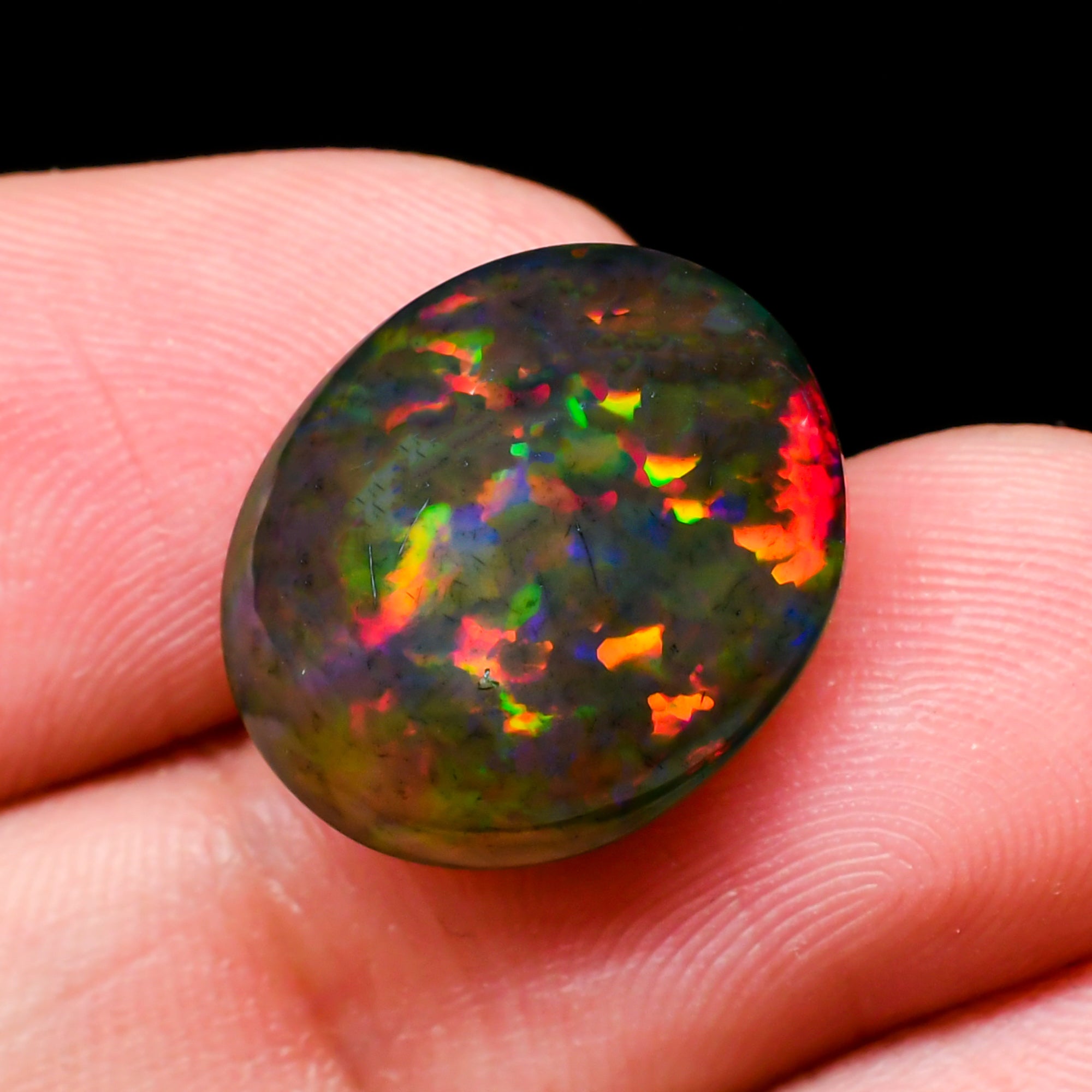 Natural Black Ethiopian Opal oval cabochon 6.55 ct L-1598 - photo 3