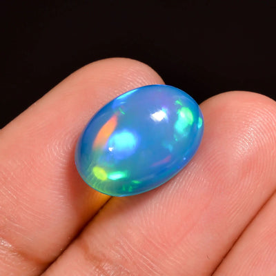 100% Natural 4.5 Ct Sky Blue Ethiopian Opal with Electric "Aurora" Multi-Color Flash (14X10X5 MM)