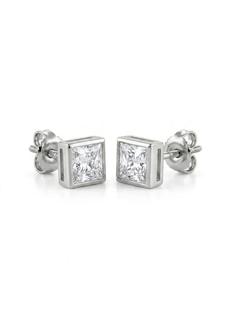 Pair of square bezel stud earrings shown at an angle to highlight sparkle