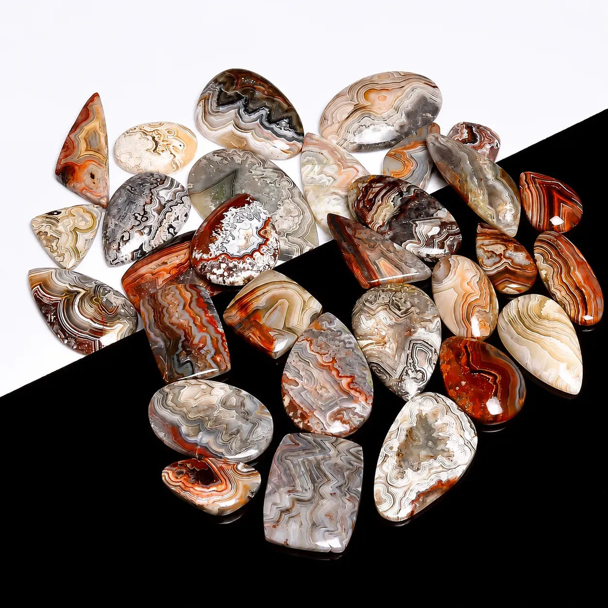Collection of patterned stones on a black and white background