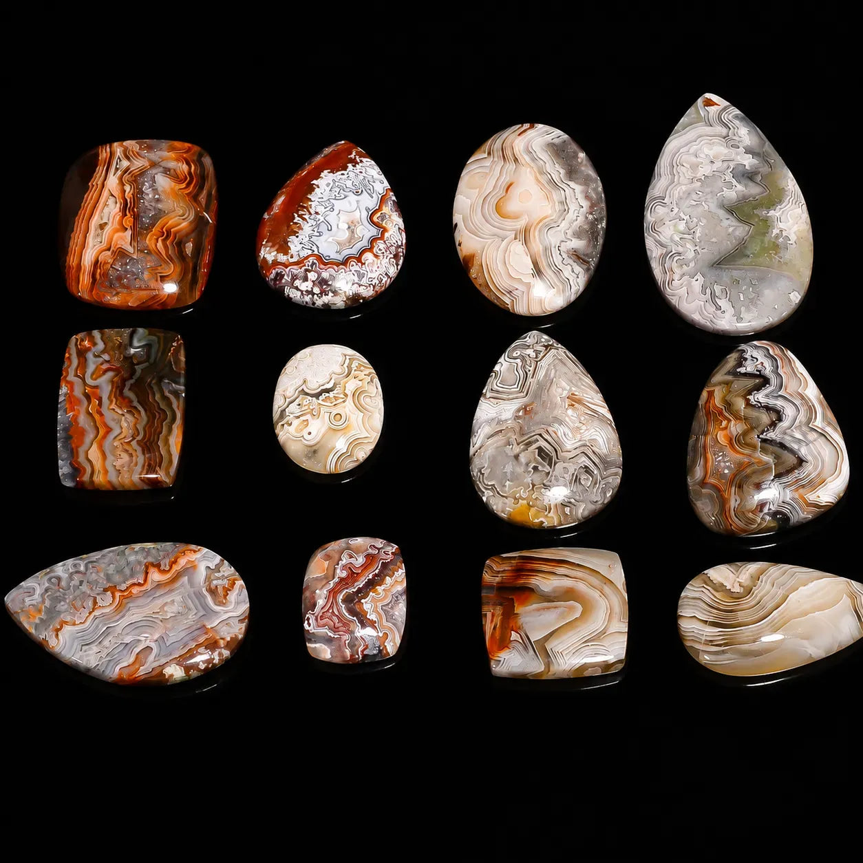 Collection of various agate stones on a black background