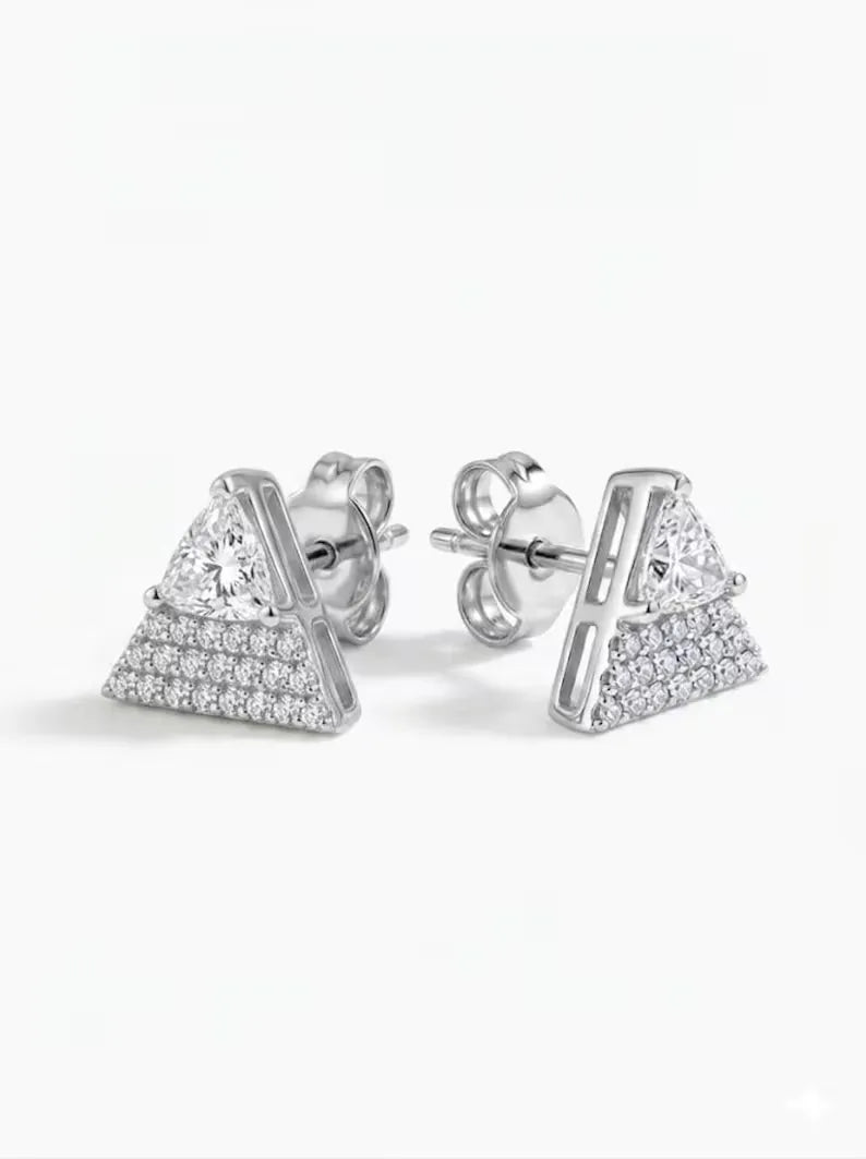 Geometric triangle statement stud earring worn on ear