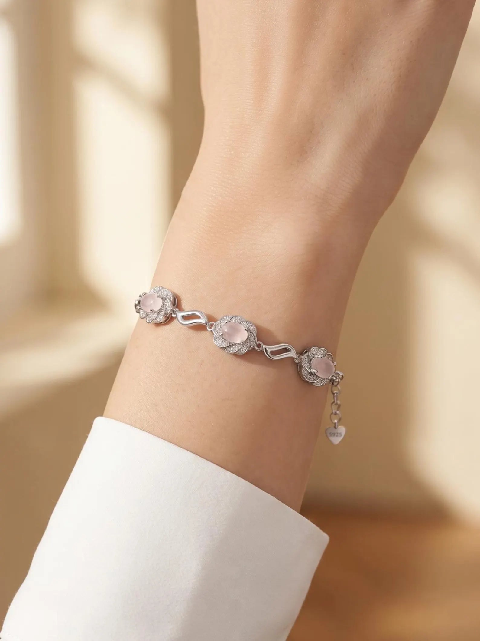 Three Floral Motifs with Soft Pink Stones 