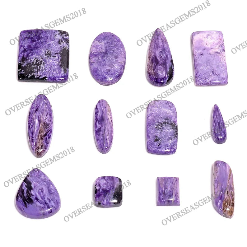 Twelve polished purple amethyst gemstone cabochons in various shapes and sizes, arranged in a grid on a white background with diagonal watermarks.