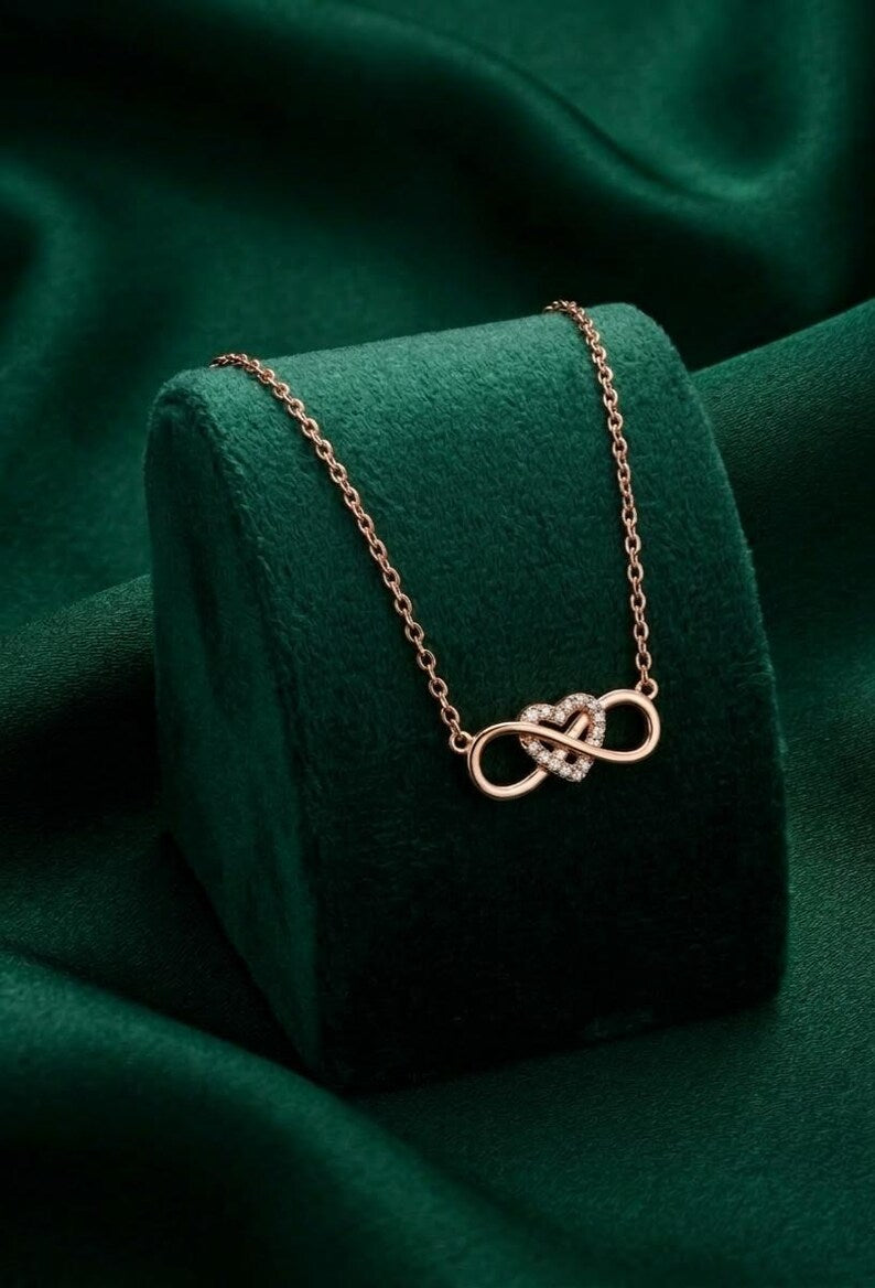 Rose gold infinity heart necklace with zircon detail