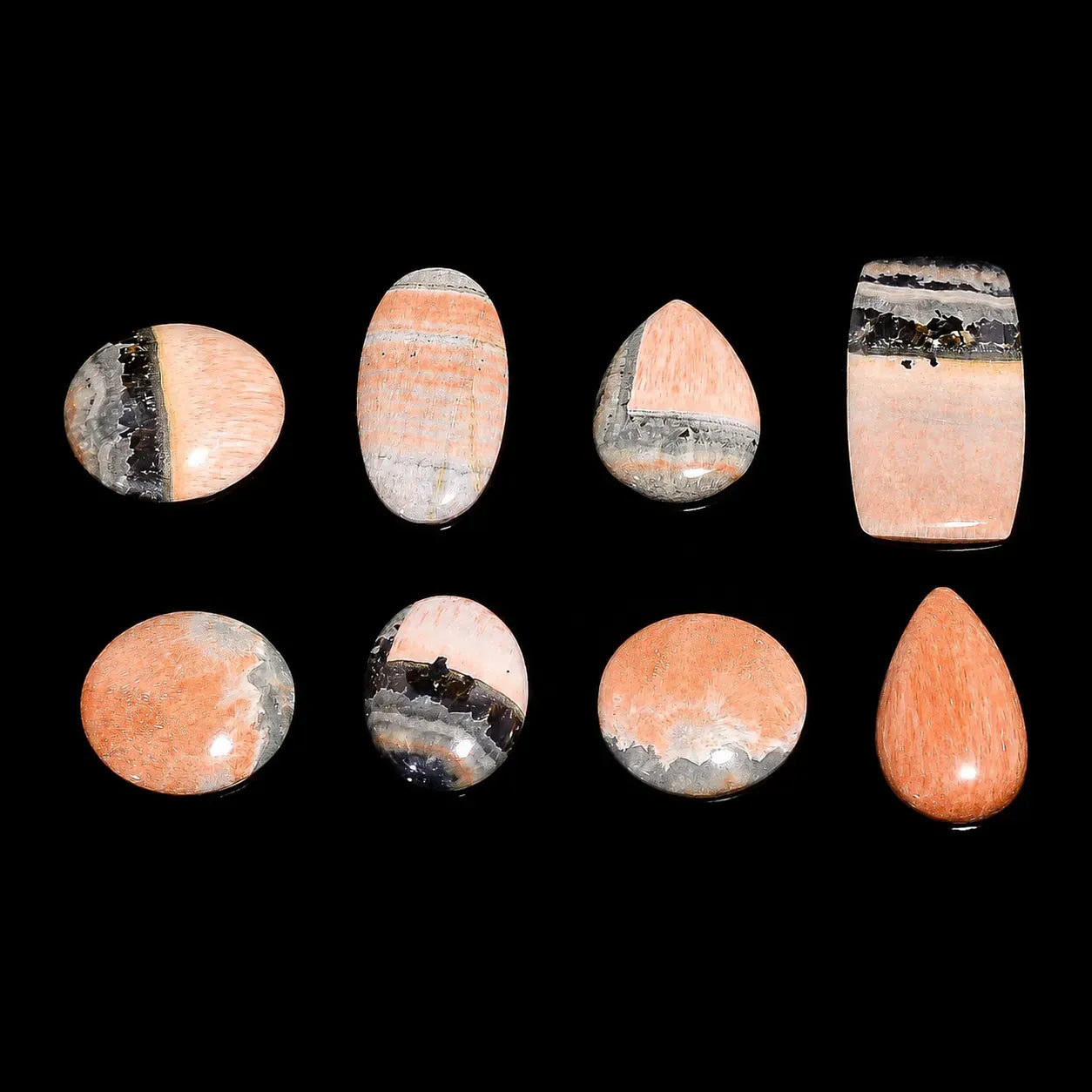 Set of multicolored stones on a black background