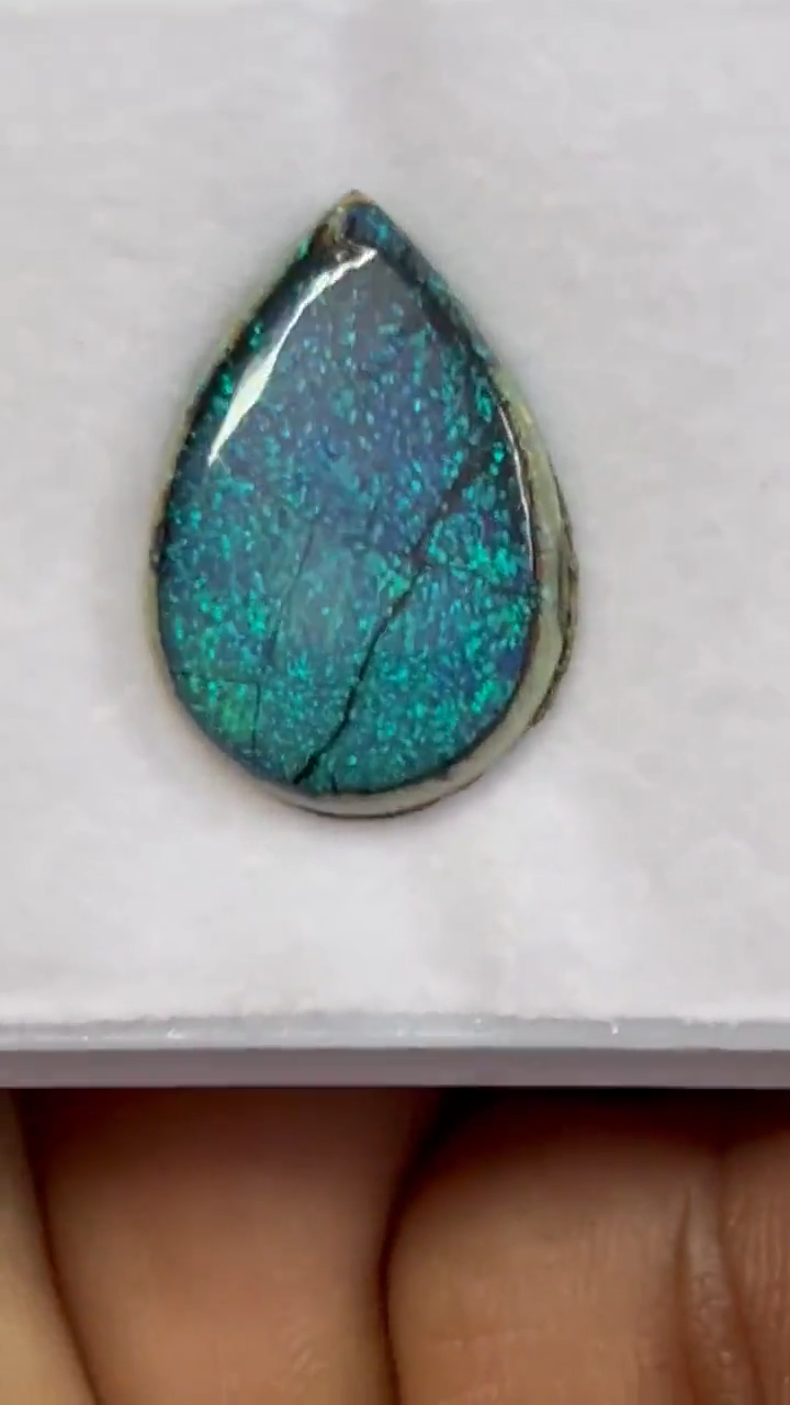 Video showcasing fire and color play in Pear Shape Sterling Opal Cabochon