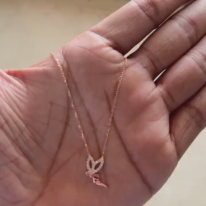 Rose gold guardian angel pendant with pave cubic zirconia stones