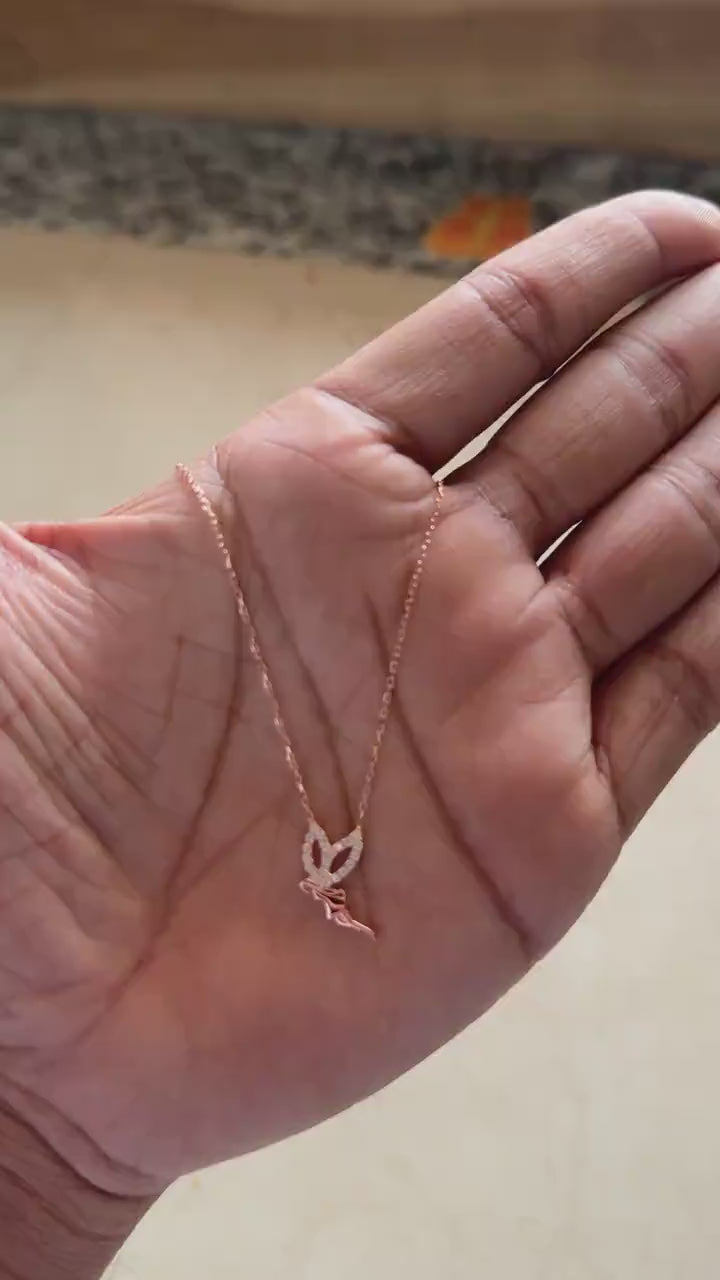 Rose gold guardian angel pendant with pave cubic zirconia stones