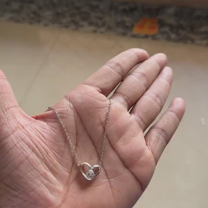 Silver open heart necklace with round zircon solitaire