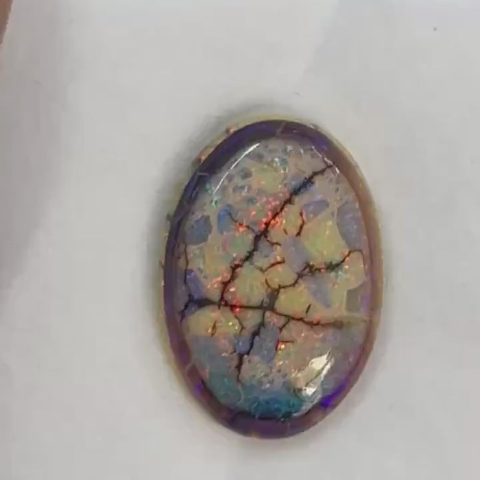 Video showcasing fire and color play in Oval Shape Sterling Opal Cabochon