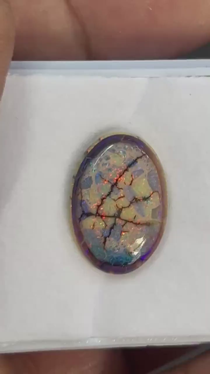 Video showcasing fire and color play in Oval Shape Sterling Opal Cabochon