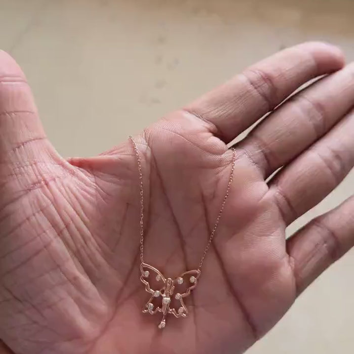 Rose gold butterfly pendant necklace with zircon detail