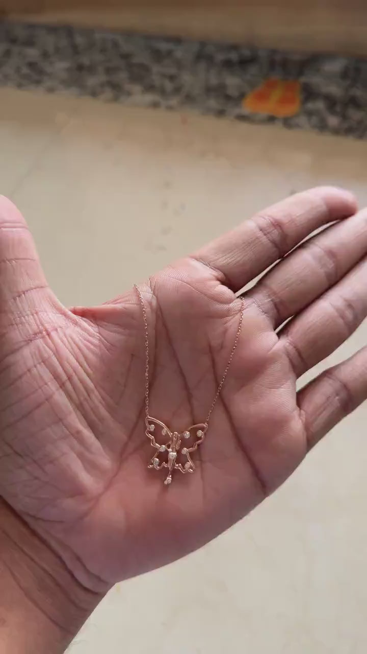 Rose gold butterfly pendant necklace with zircon detail
