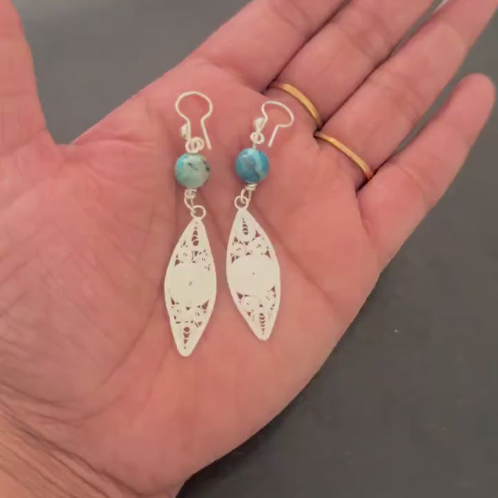 Marquise filigree earrings shown from the side