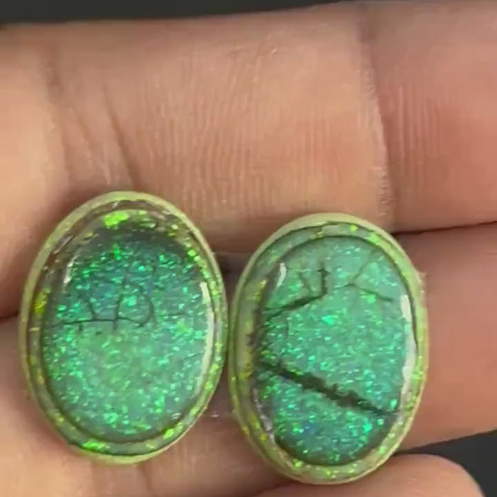 Video showcasing fire and color play in 12 carat Fancy Sterling Opal Cabochon