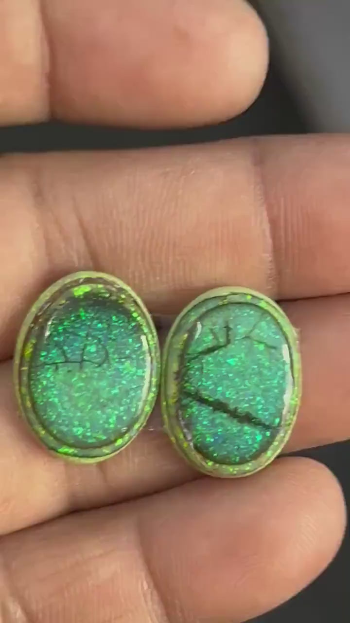 Video showcasing fire and color play in 12 carat Fancy Sterling Opal Cabochon