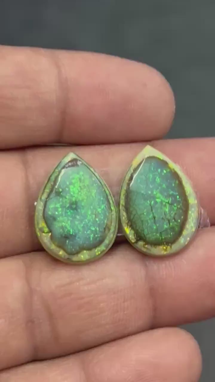 Video showcasing fire and color play in Fancy Shape Sterling Opal Cabochon, 9 carats