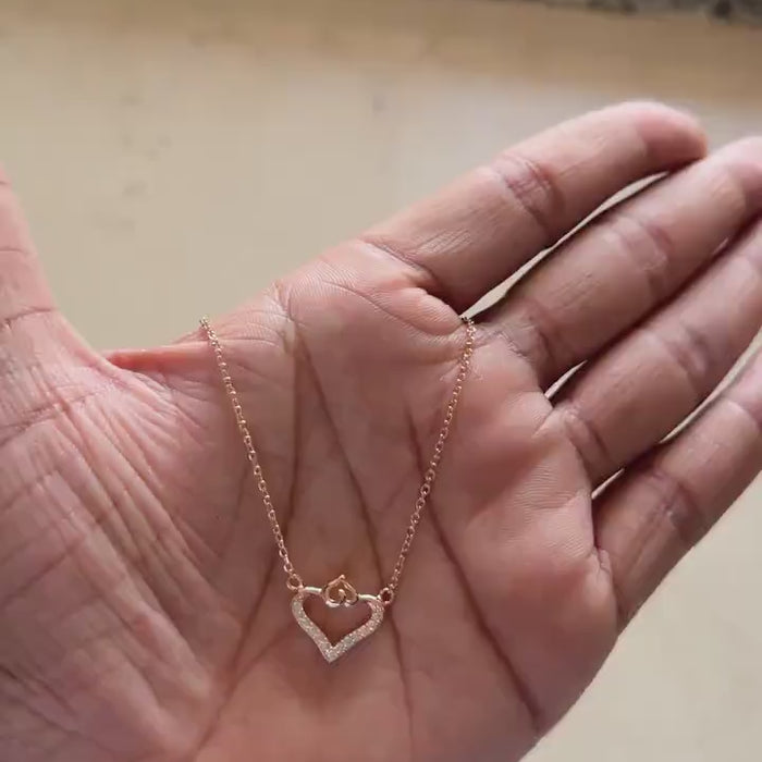 Double heart necklace displayed