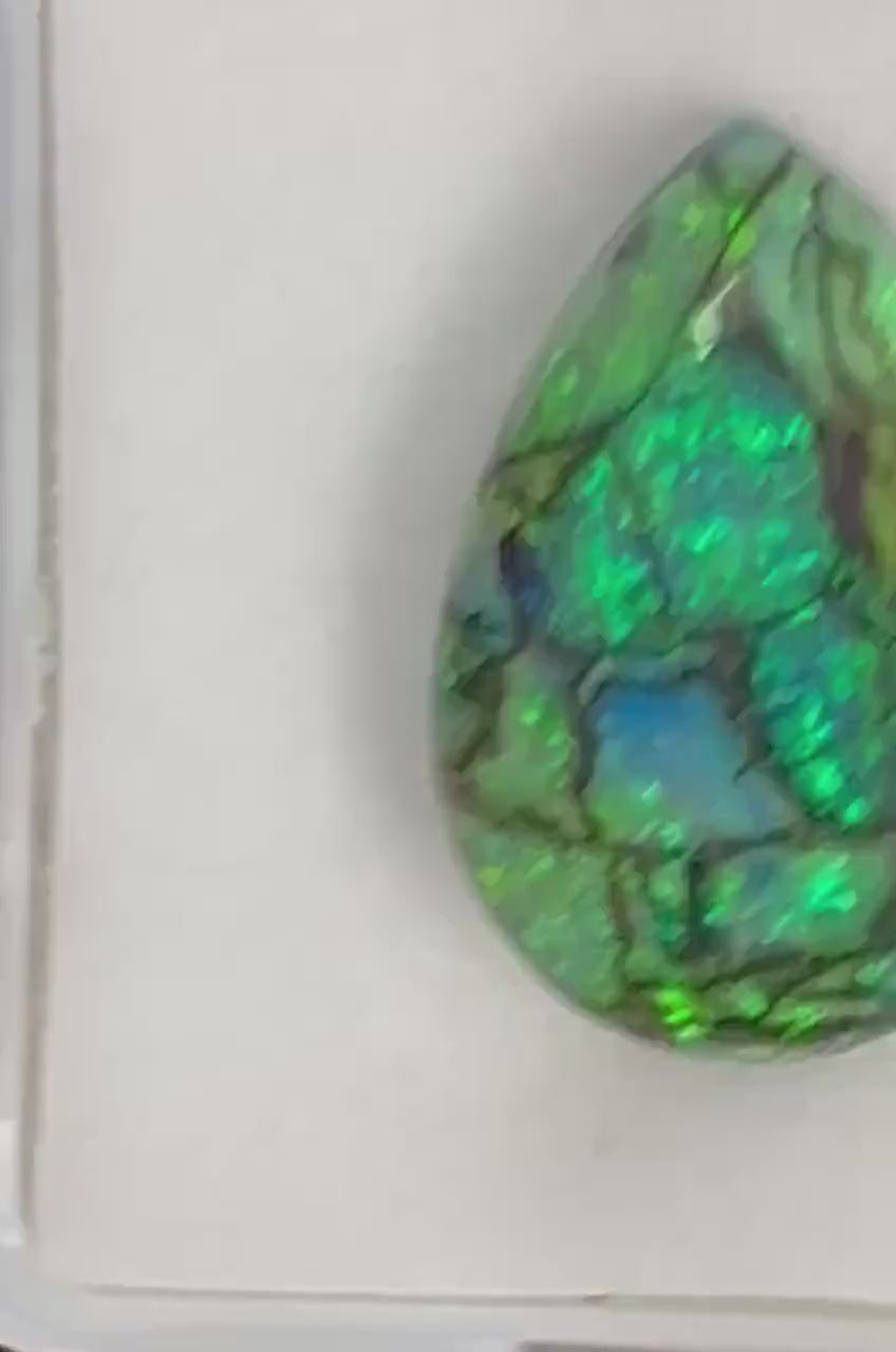 Video showcasing fire and color play in Pear Shape Sterling Opal accent stone