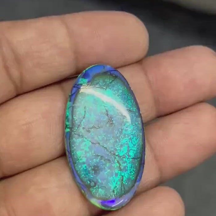 Video showcasing play-of-color and fire in Oval Shape Monarch Opal Cabochon