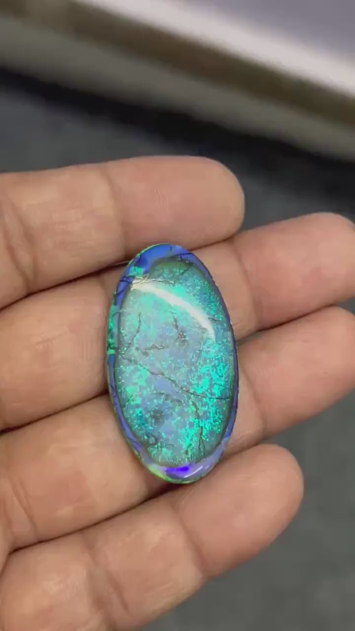 Video showcasing play-of-color and fire in Oval Shape Monarch Opal Cabochon