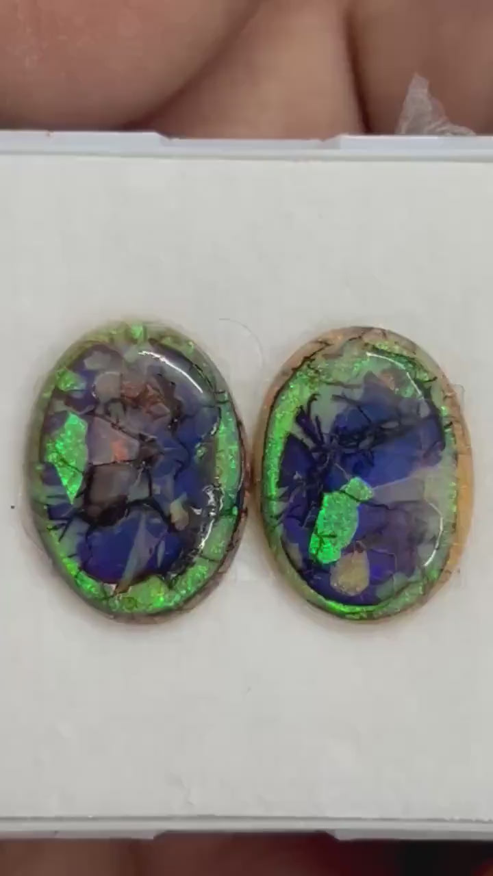 Video showcasing fire and color play in matched pair Sterling Opal Cabochons