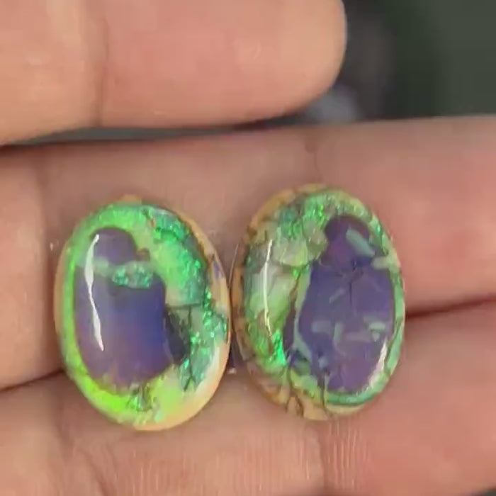 Video showcasing fire and color play in this unique Fancy Shape Sterling Opal Cabochon