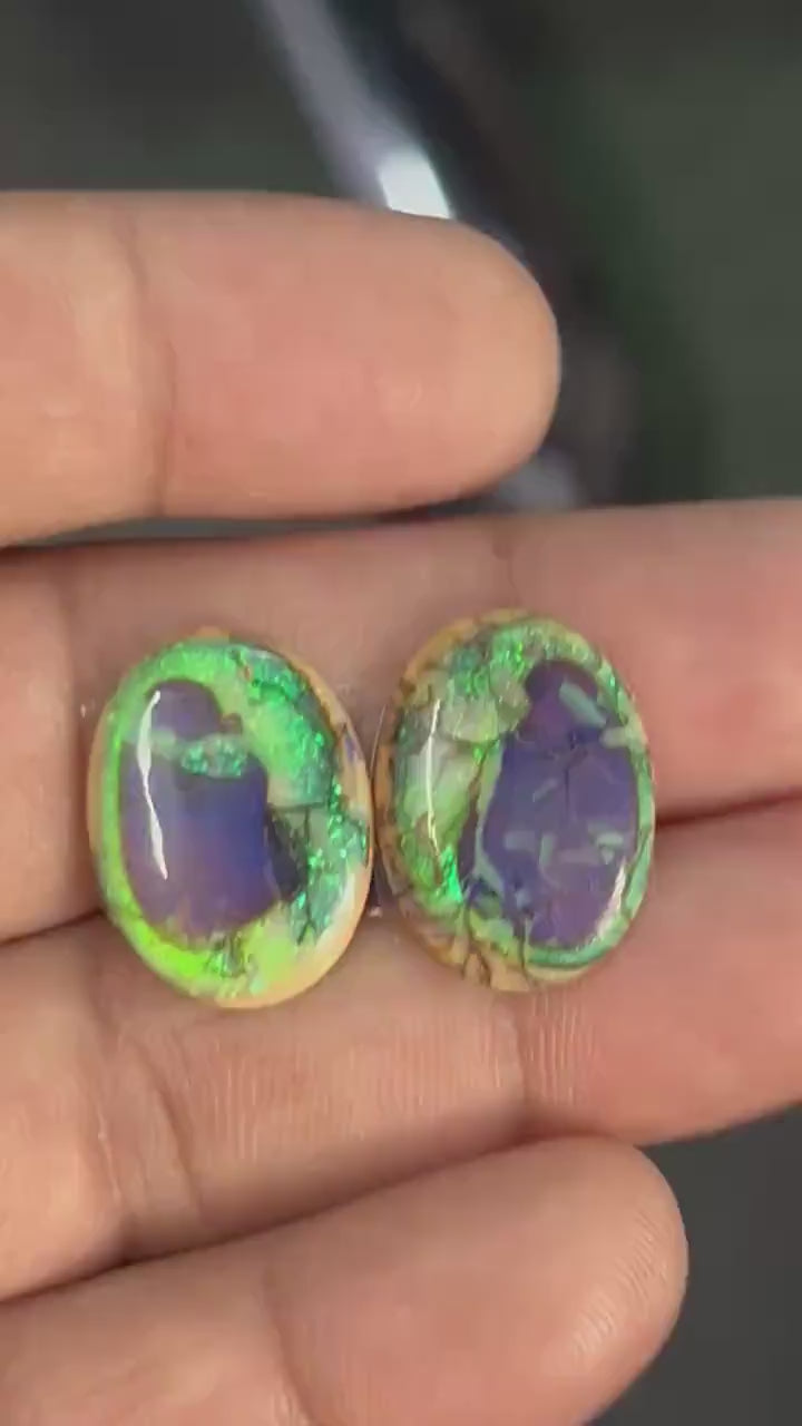 Video showcasing fire and color play in this unique Fancy Shape Sterling Opal Cabochon