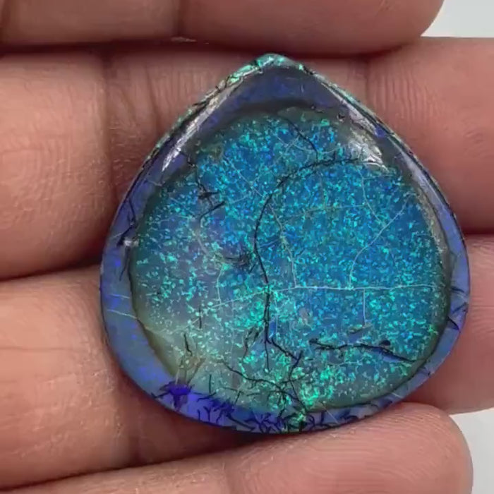 Video showcasing play-of-color and fire in Heart Shape Monarch Opal Cabochon