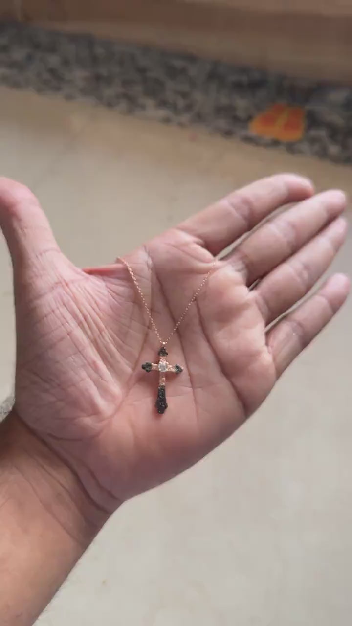Rose gold cross pendant necklace with black and white pave stones