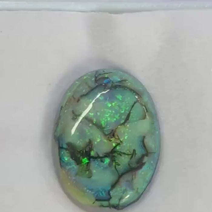 Video showcasing fire and color play in Oval Shape Sterling Opal Cabochon, 7 carats