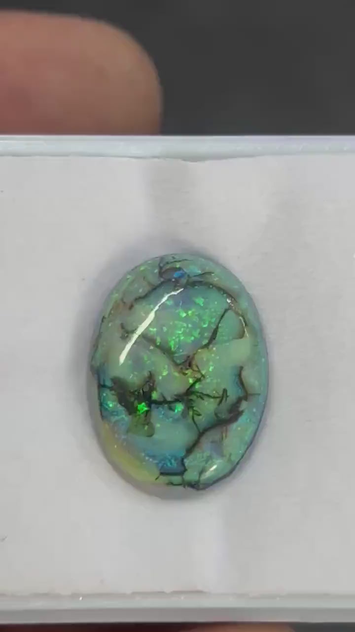 Video showcasing fire and color play in Oval Shape Sterling Opal Cabochon, 7 carats