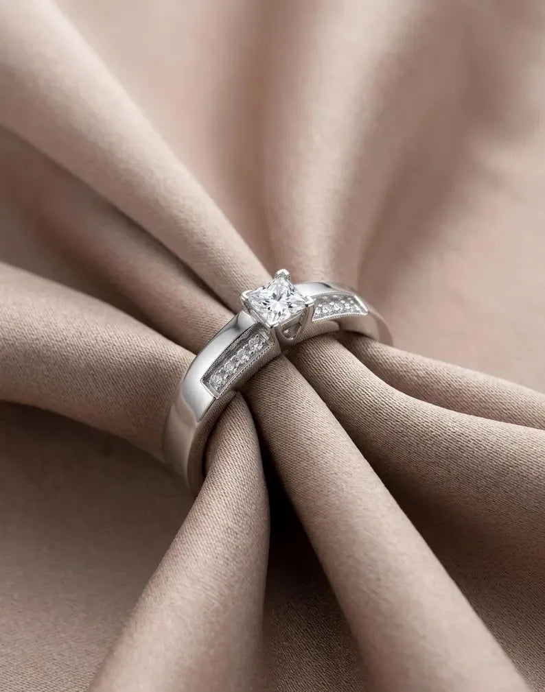 Side angle view of 925 sterling silver minimalist princess cut engagement ring