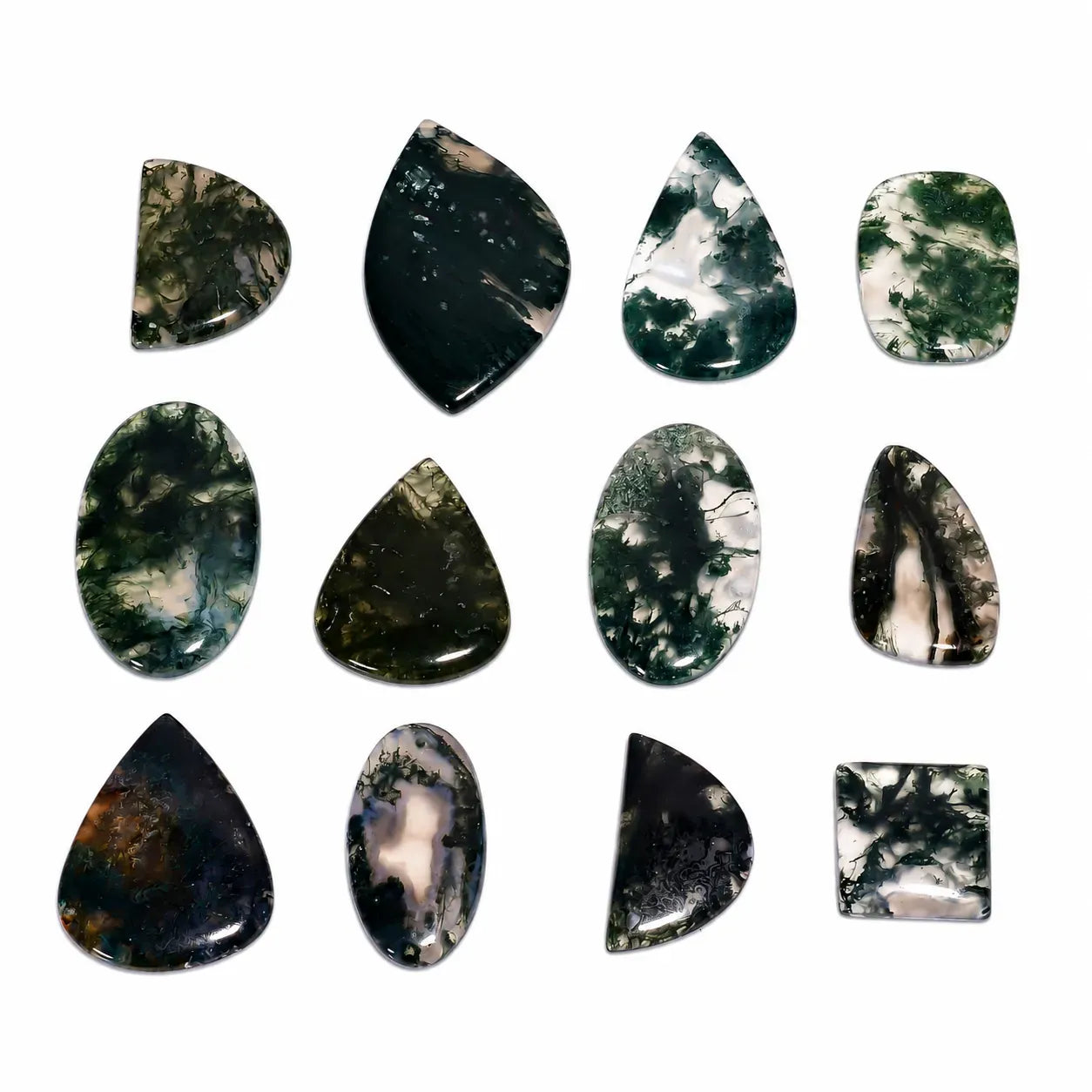Collection of teardrop-shaped black and white stones on a white background