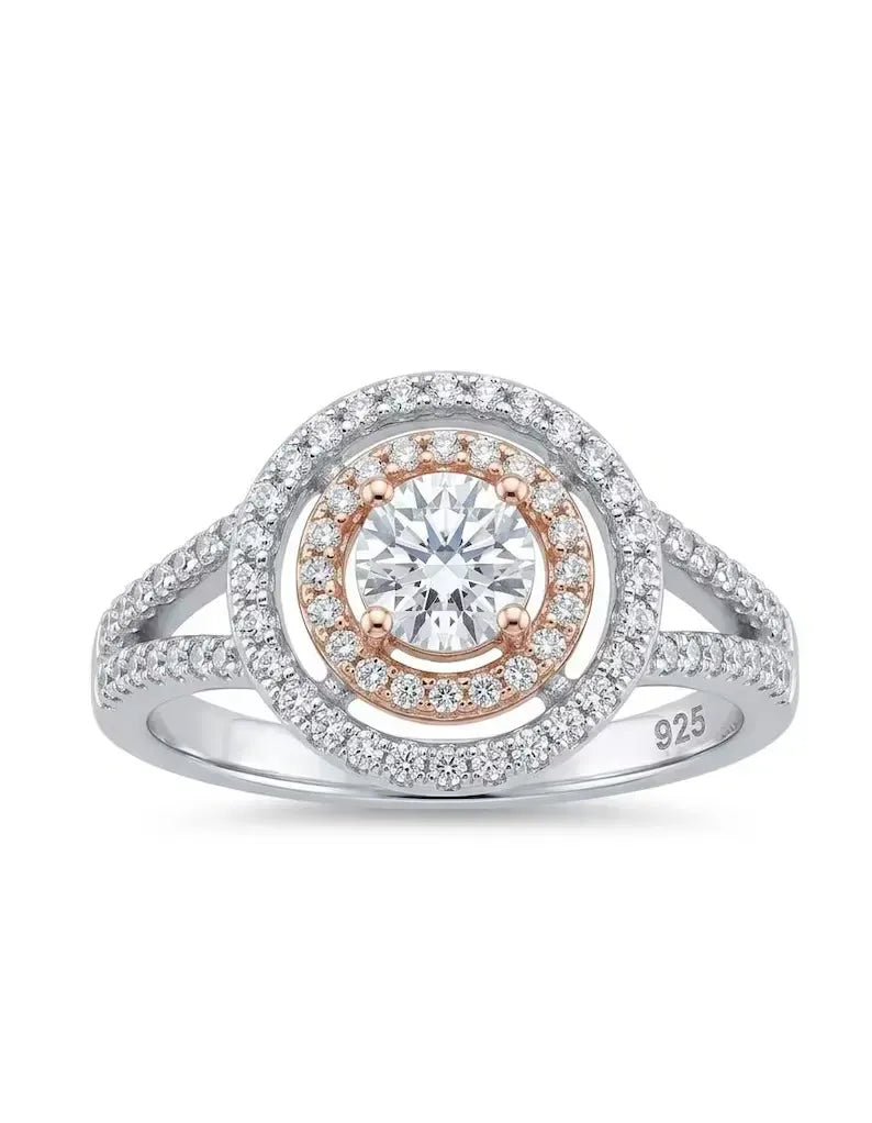 Front view of 925 sterling silver round halo ring with rose gold accent and split shank pave band