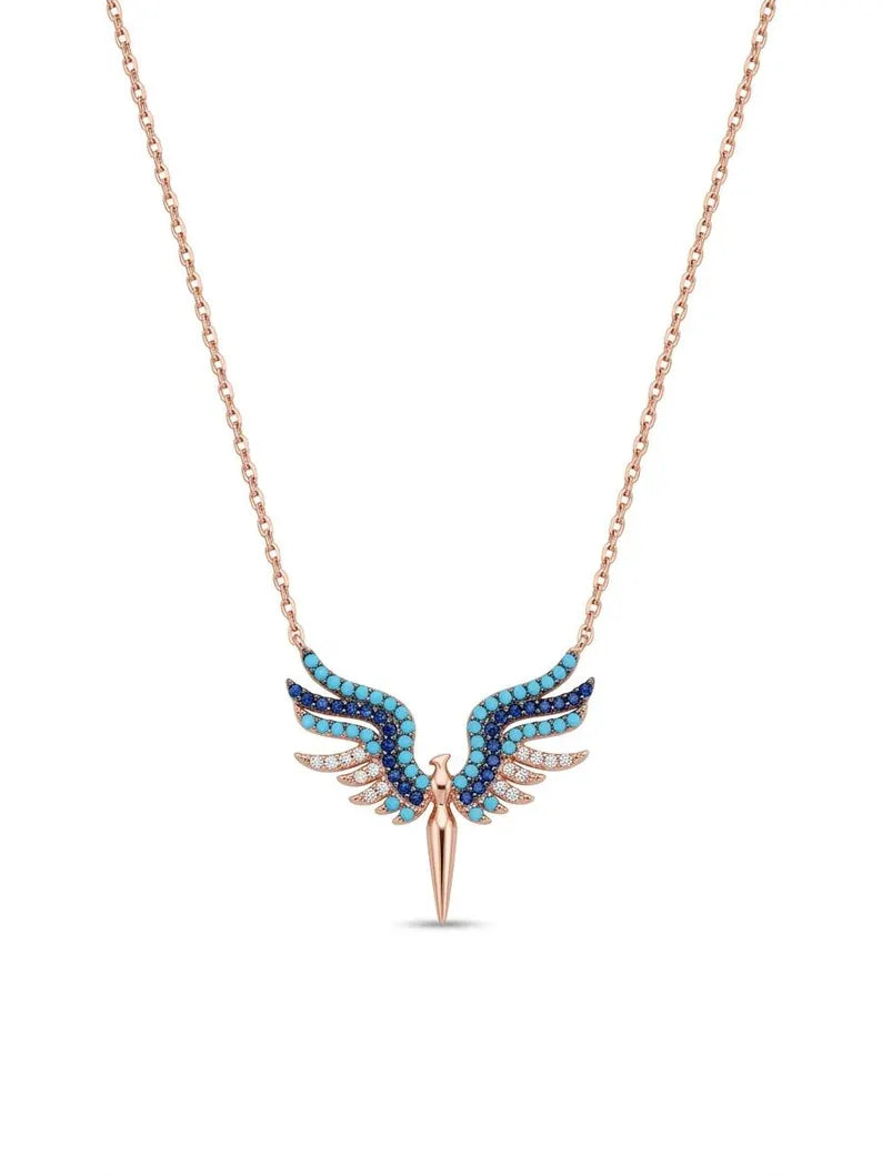Rose gold angel wing necklace with turquoise and navy CZ stones