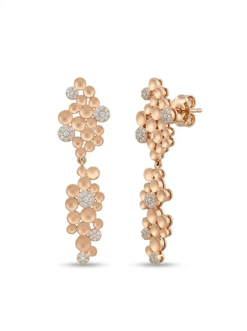A pair of rose gold dangle earrings with a textured, grape-like cluster design accented with small clear crystals, shown against a plain white background.