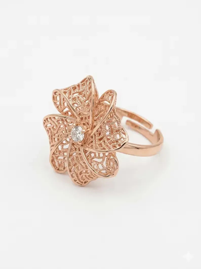 Side angle view of 925 sterling silver adjustable rose gold floral lace ring