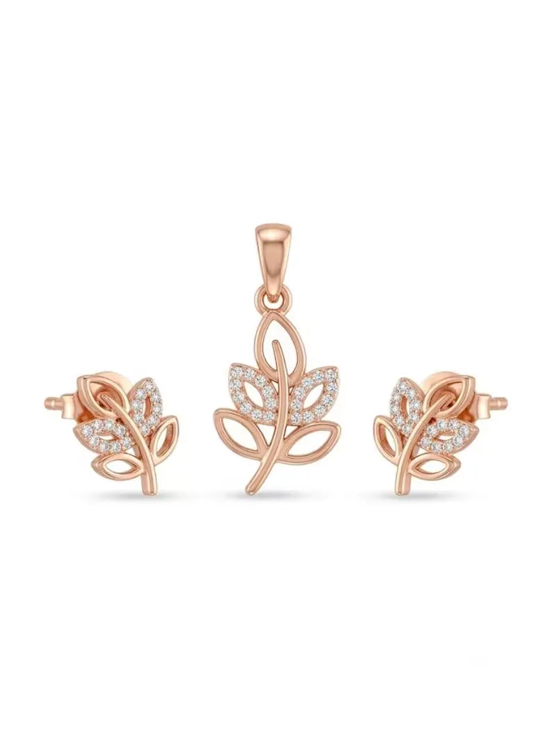 Rose gold jewelry set featuring a leaf-shaped pendant and matching stud earrings with pavé-set clear stones, displayed on a clean white background.